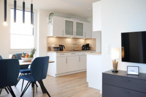 BeltBlick 4 - Moderne Ferienwohnung direkt am Strand mit Sauna und Meerblick!, Fehmarn